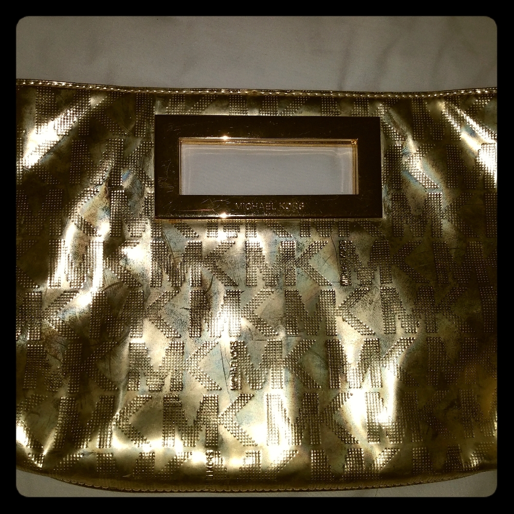 Michael Kors Gold monogram clutch bag